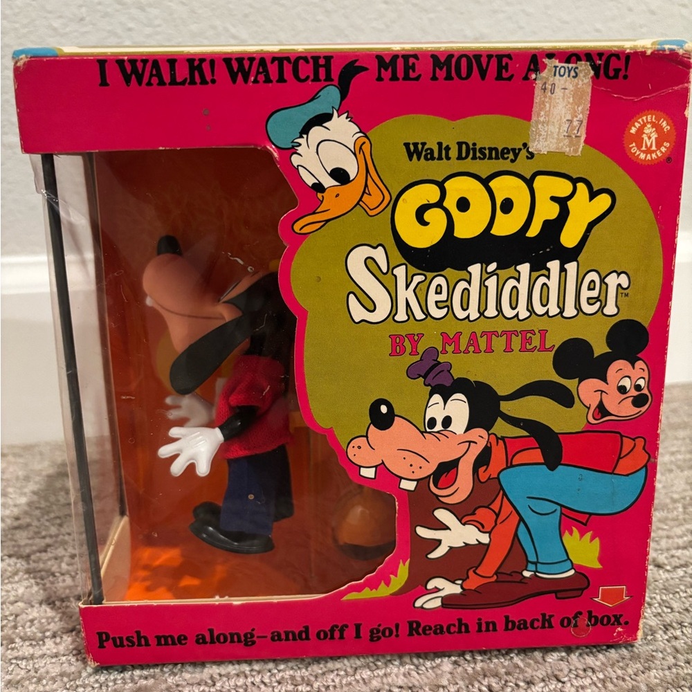 New-in-box vintage Disney Mattel Goofy Skediddler walking toy
